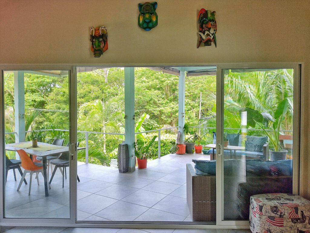 Tropical garden view at Casa ceiba, hotel and rental income property for sale at Samara Beach, Guanacaste, Costa Rica