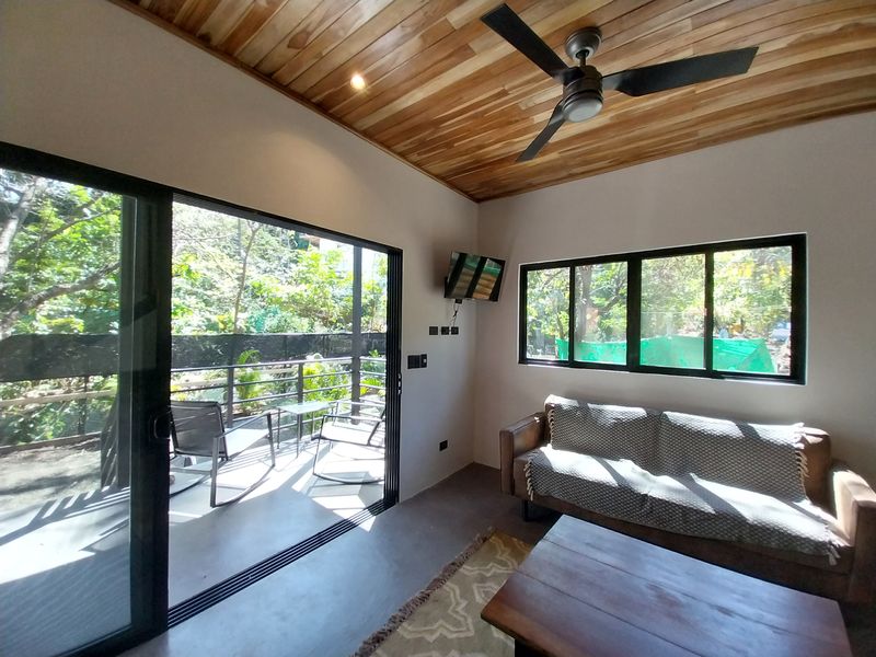 lounge area open to the balcony at Casa Isa home for sale samara guanacaste costa rica