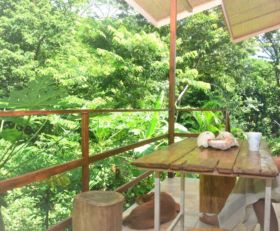 Dining table on terrace at Casa La Isla, rental income property for sale at Samara Beach, Costa Rica