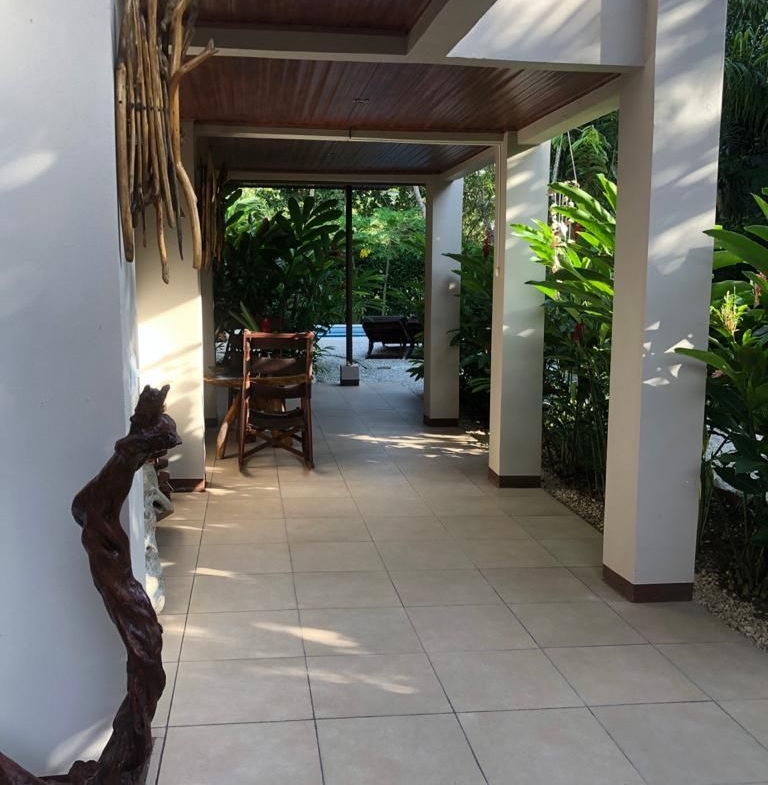 Garden view of Relax Lodge hotel and rental income property, for sale atSamara Beach, Guanacaste, Costa Rica