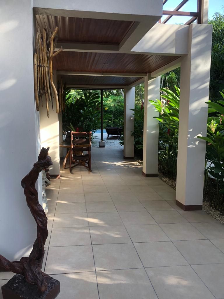 Garden view of Relax Lodge hotel and rental income property, for sale atSamara Beach, Guanacaste, Costa Rica