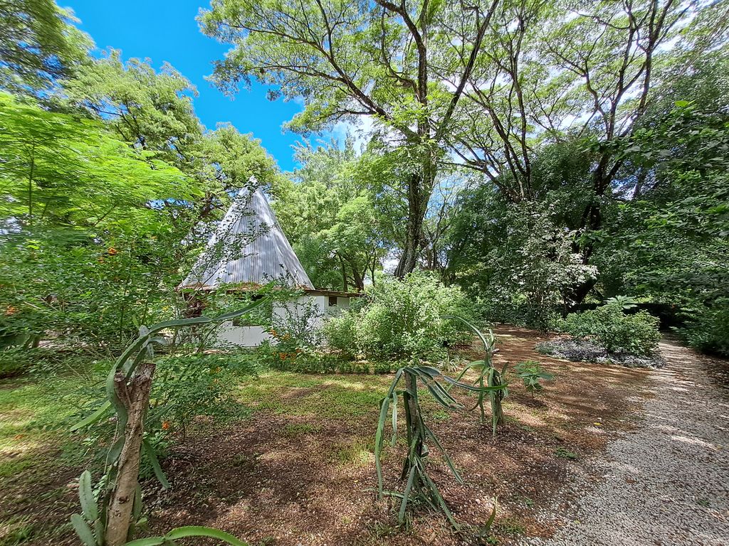 Nice tropical jardin of Casa Las Maracas, home for sale at Esterones close to Samara Beach, Guanacaste, Costa Rica