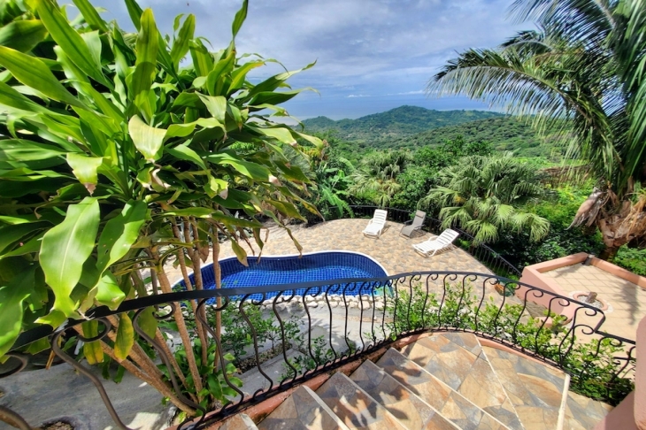 staircases leading to the pool at Villa Amanecer, house for sale at Carrillo Beach, Guanacaste, Costa Rica
