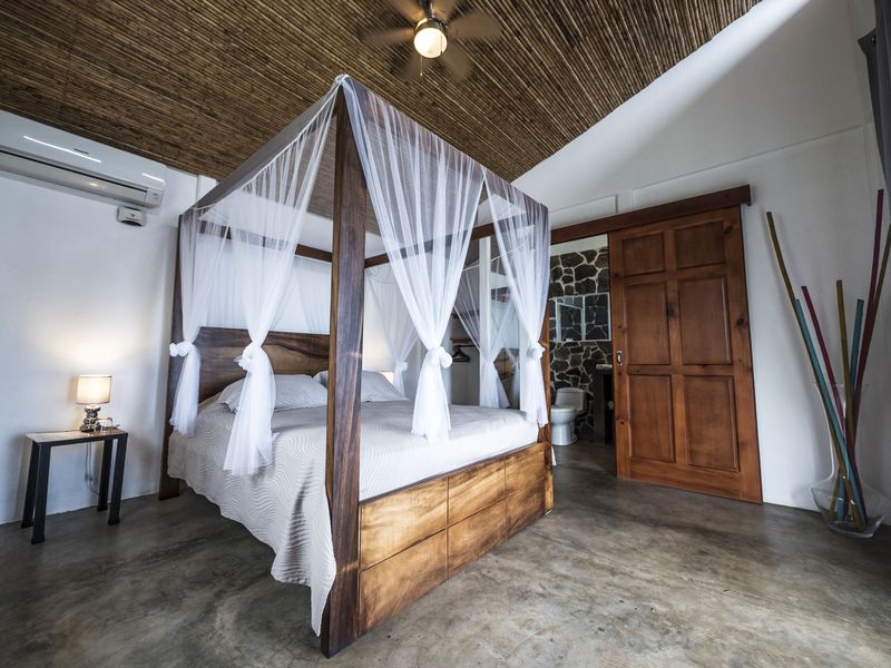 magnificent four-poster bed at the Peaceful Retreat Hotel for sale at Carillo Beach Costa Rica