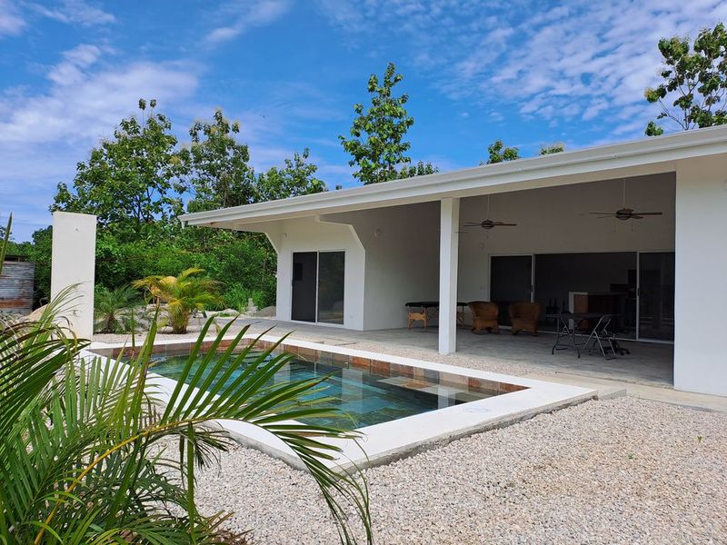 terrace with pool area of Casa colina mono home for sale samara costa rica