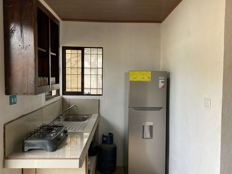 small equipped kitchen in Casa Munoz home for sale samara costa rica