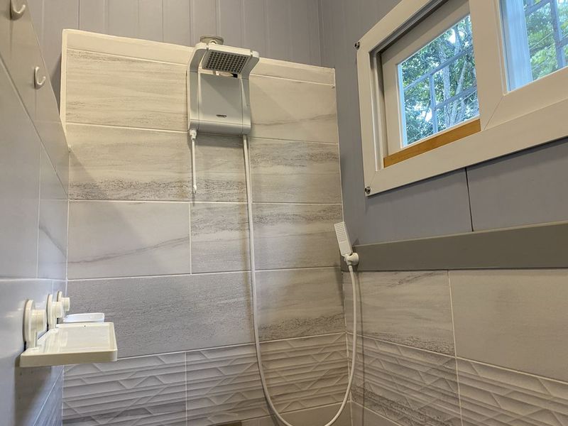Modern shower of Casa Pequeño home for sale samara costa rica