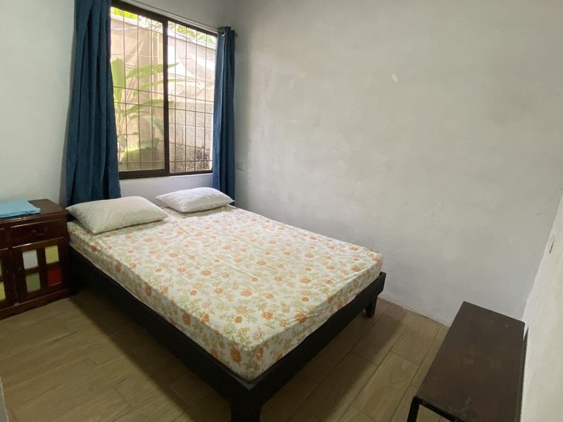double bed in bedroom of Casa Munoz home for sale samara costa rica