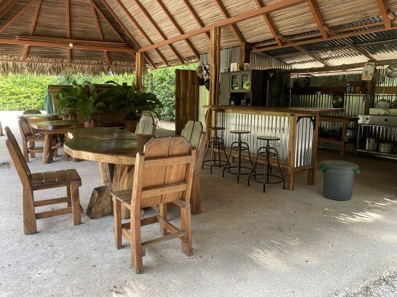 covered deck with dining area at the holistic yoga retreat hotel for sale samara guanacaste costa rica
