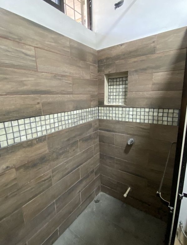 modern tiled shower in Casa Munoz home for sale samara costa rica