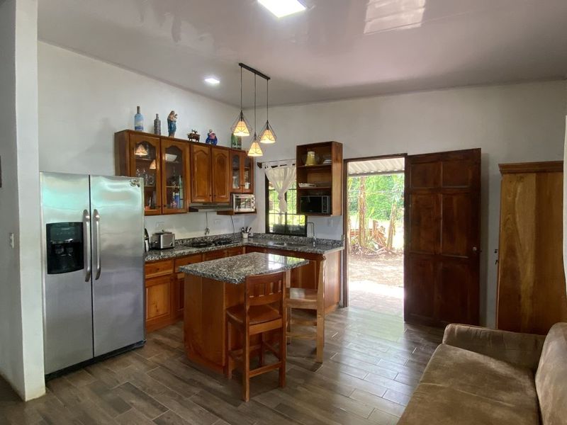 fully equipped kitchen of Casa Munoz home for sale samara costa rica