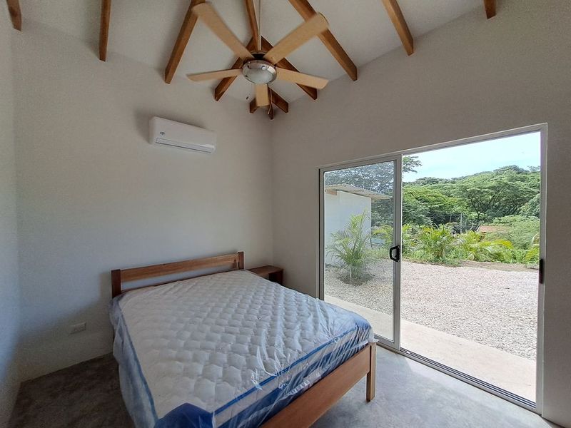 bedroom with new matress and air conditioning in Casa colina mono home for sale samara costa rica