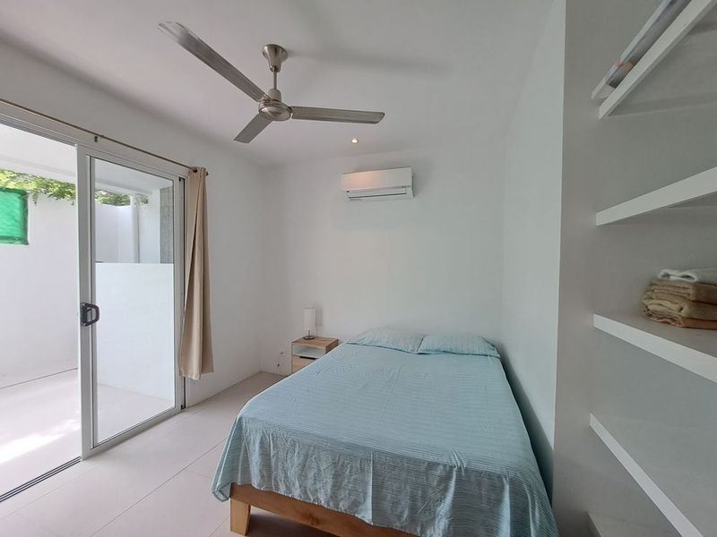 Good size bedroom with build in closet at Casa Mar y sol home for sale samara guanacaste costa rica