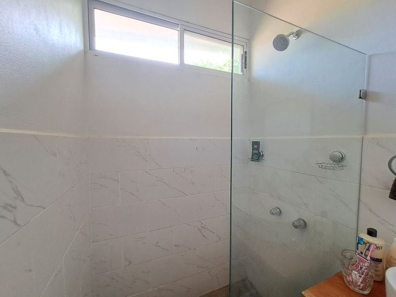 modern bathroom of Casa colina mono home for sale samara costa rica