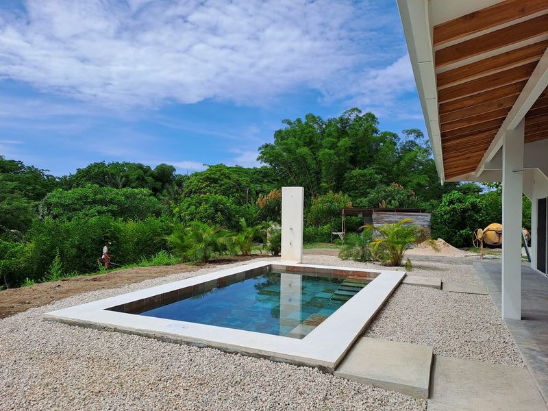 beautiful swimming pool with shower of Casa colina mono home for sale samara costa rica
