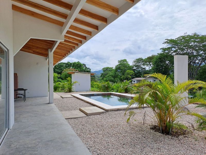 garden and pool view of Casa colina mono home for sale samara costa rica