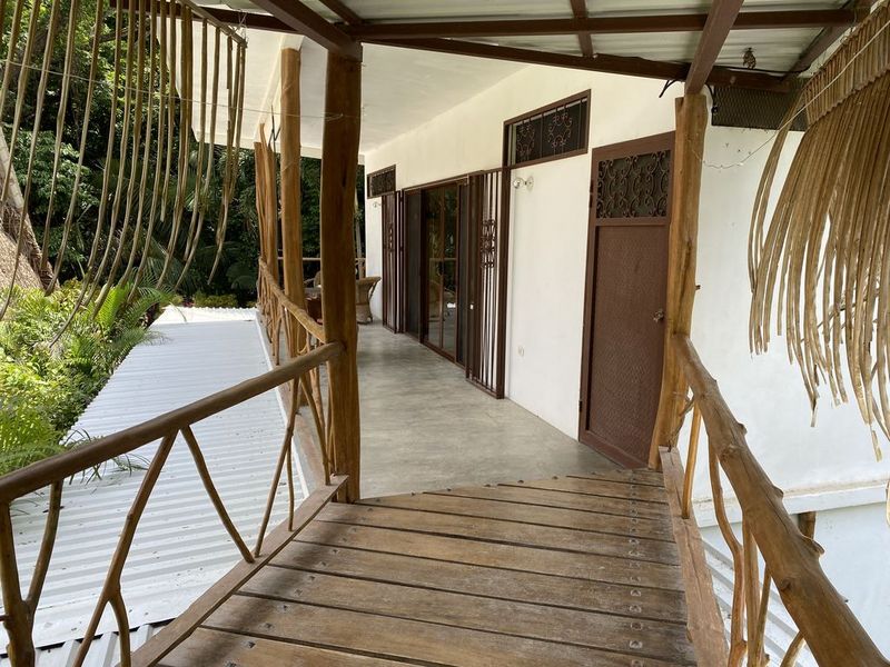 wooden covered patio at the holistic yoga retreat hotel for sale samara guanacaste costa rica