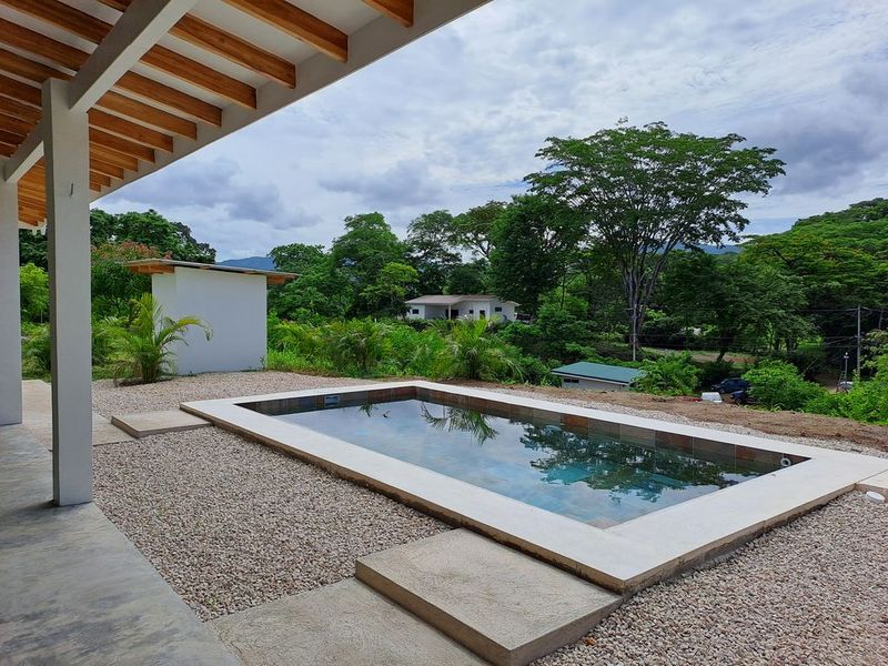 pool area of Casa colina mono home for sale samara costa rica