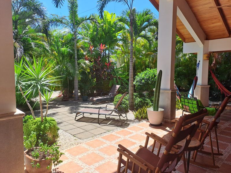 Outdoor terrace with green views at Casa Vista Las Palmas home for sale samara guanacaste costa rica