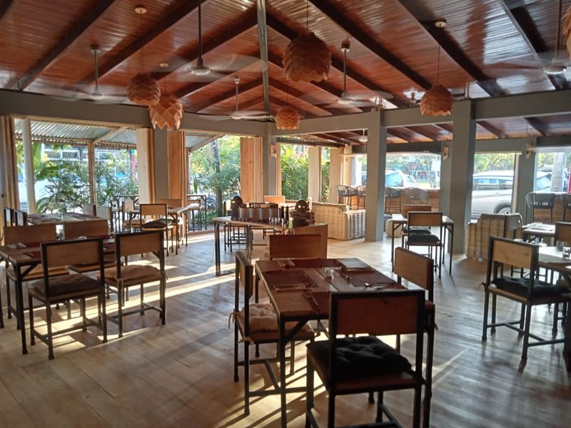 nice tropical dining area at restaurant Porque Si business for sale Samara costa rica
