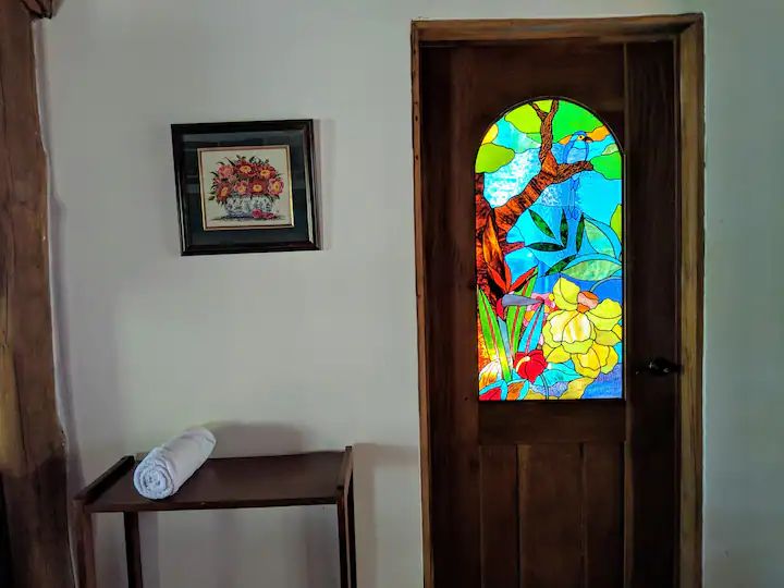 beautiful door with stained glass at Casa KUPU KUPU home for sale samara Guanacaste Costa Rica