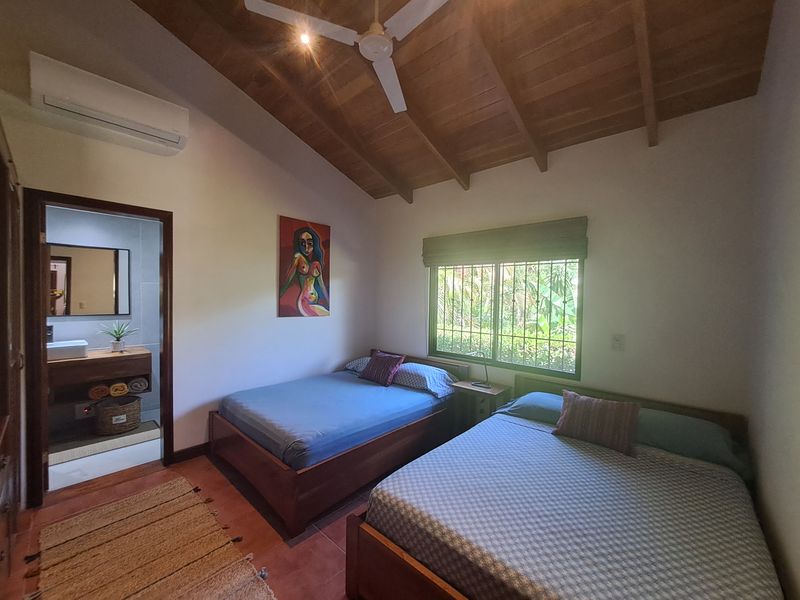 2 beds in bedroom of Casa Vista Las Palmas home for sale samara guanacaste costa rica