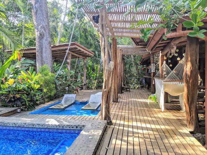 Tropical outdoor terrace with hammocks at Casa KUPU KUPU home for sale Playa Carillo Guanacaste Costa Rica