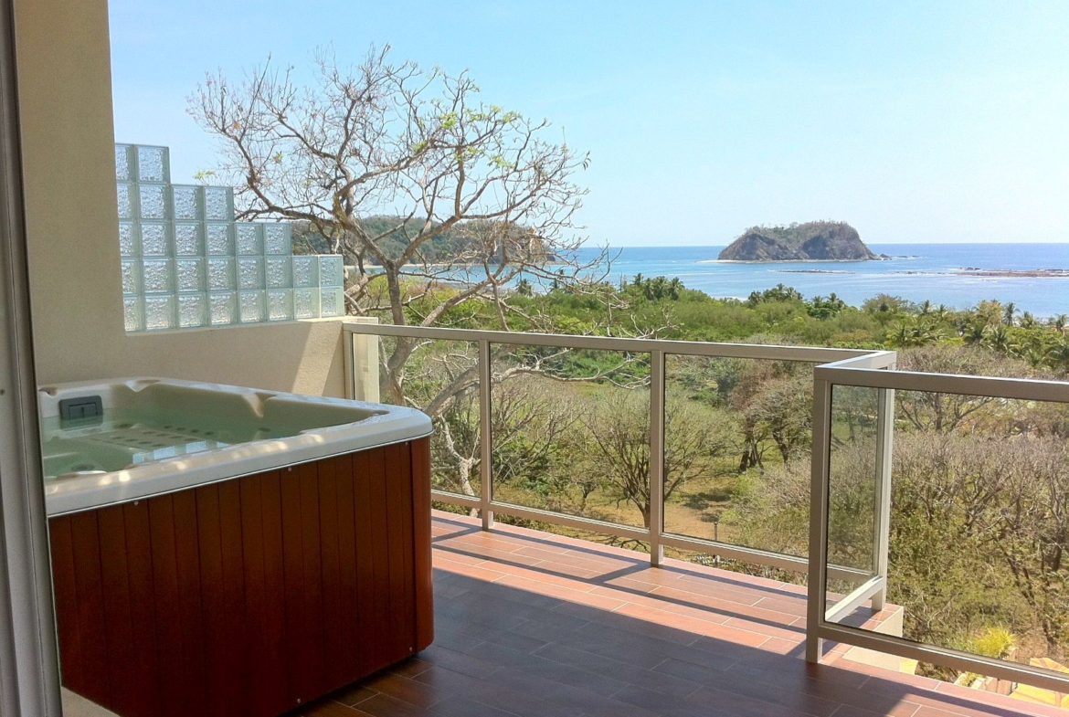 Jacuzzi on a balcony and at the back ocean and Isla Chora Samara Reef Condo for sale Samara Guanacaste Costa Rica
