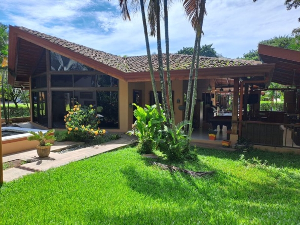 lovely garden with palm trees in Casa Garcia home for sale Samara Guanacaste Costa Rica
