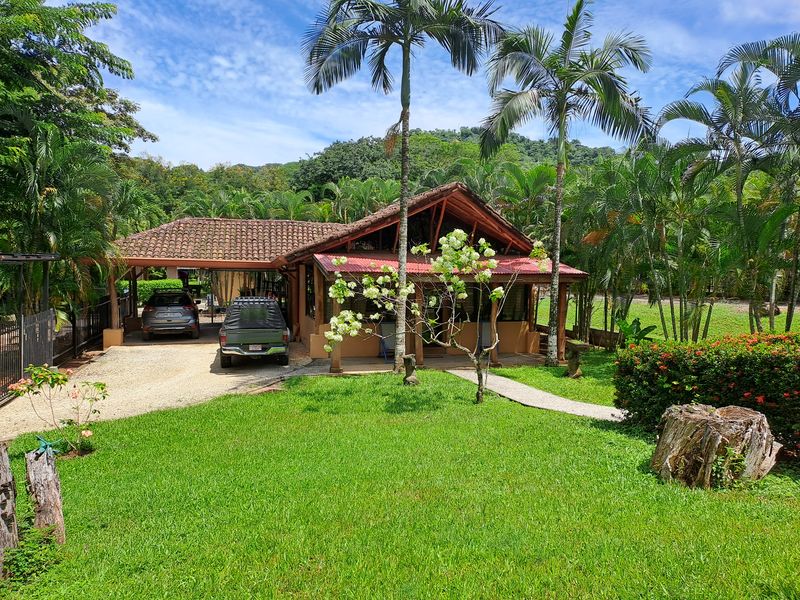 beautiful green garden in front of Casa Garcia home for sale Samara Guanacaste Costa Rica