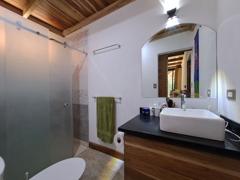 nice bathroom with shower at Casa Jungle Oasis home for sale Samara Woods Samara Costa Rica