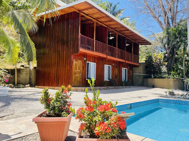 wooden residence with pool at Casa Surfside home for sale Samara Guanacaste Costa Rica