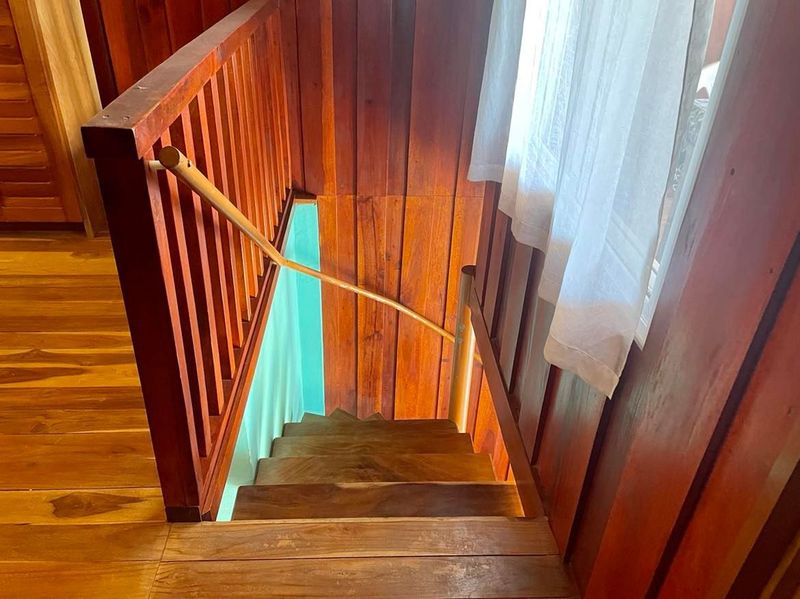 beautiful wooden stairs at Casa Surfside home for sale Samara Guanacaste Costa Rica