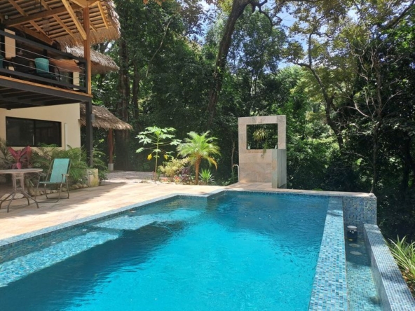pool area with shower of Casa Jungle Oasis home for sale Samara Woods Samara Costa Rica