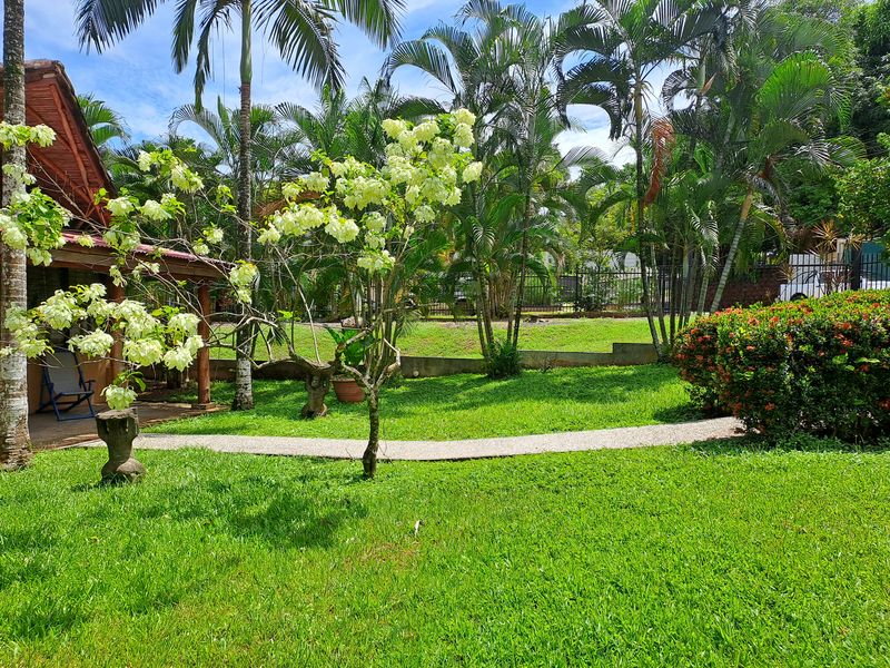 green areas and flowers in Casa Garcia home for sale Samara Guanacaste Costa Rica